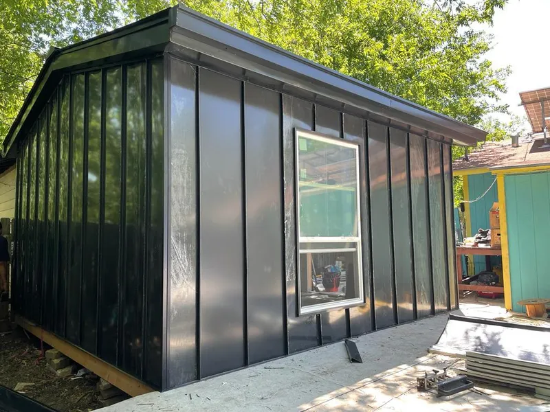 Black standing seam metal wall panels for Roof Inspection in Apollo Beach